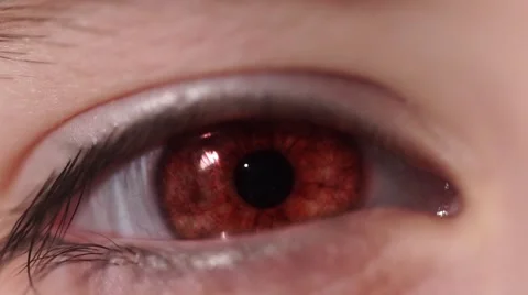 Fire in Children's Eye. An Eye Blinks and Changes Color to the Blue. Video stock 60618958