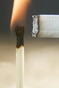 Fire to a cigarette Stock Photos