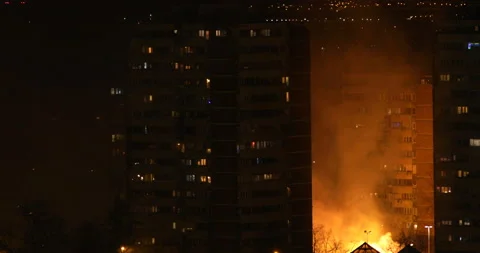 Fire in city at night Stock Footage 145884645