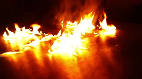 Fire close up dancing on reflective surface Stock-Footage 38132225
