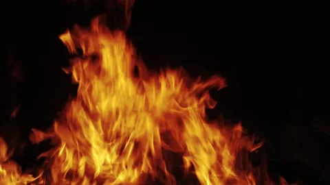 Fire close-up of flames of fire on a black background in complete darkness Stock Footage 171653805