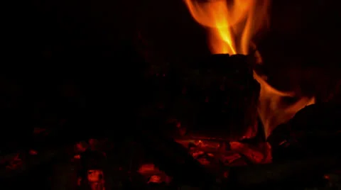 Fire close up shallow depth of field pan up Stock Footage 24704108