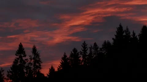 Fire clouds in the evening sky Stock Footage 346125401