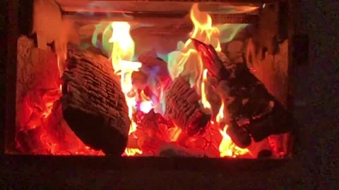 Fire Colorful Light Display Burning in Fireplace Slow Motion Stock Footage 301348156