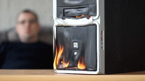 The fire of the computer system unit in the room, the sleeping man wakes up Video stock 153795718