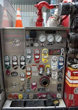 Fire control panel of pumps and water pressure of  fire truck FDNY Ten House. Stock Photos