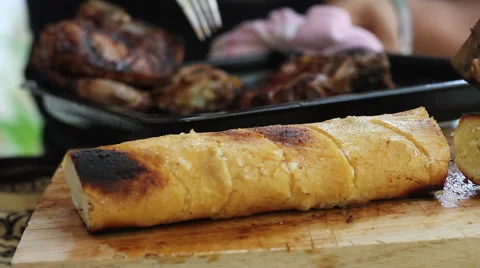Fire Cooked Bread Roll on the Chopping Block 3 Stock Footage 42681961