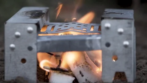 Fire cooker in forest Video stock 77016569