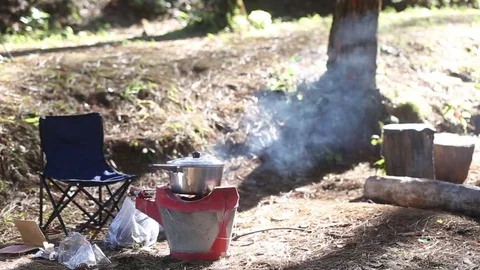 Fire for cooking on camping in forest. Stock Footage 70781715