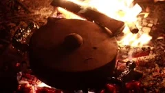 https://images.pond5.com/fire-cooking-food-wood-embers-footage-153661397_iconm.jpeg