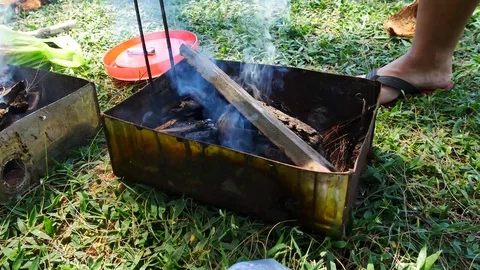 Fire for cooking or bbq, grill with charcoal. Video stock 70187543