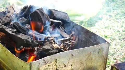 Fire for cooking or bbq, grill with charcoal. Stock Footage 70187712