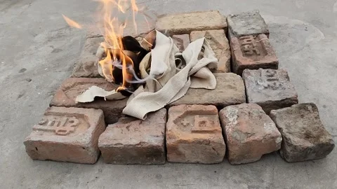 Fire in cot rope for warming hand Stock Footage 234932642
