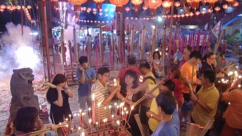 Fire crackers lighted during chinese dev... | Stock Video | Pond5