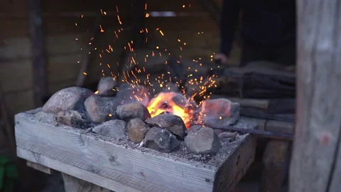 Fire crackling in blacksmith workshop of forging metal. Anonymouse craft smith Stock Footage 144833581