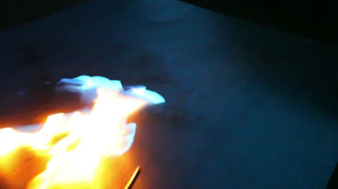 Fire cross dancing on reflective surface Stock-Footage 38121734