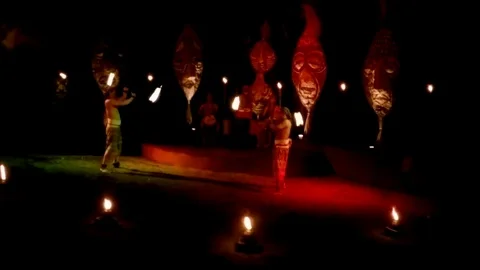 Fire dance in african inspired show in bali Stock Footage 74043195