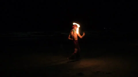 Fire dancer on a beach Stock Footage 27795416