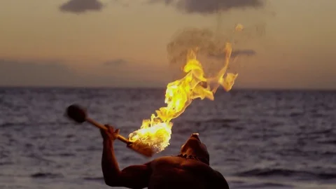 A fire dancer on the beach of Hawaii Stock Footage 76202416