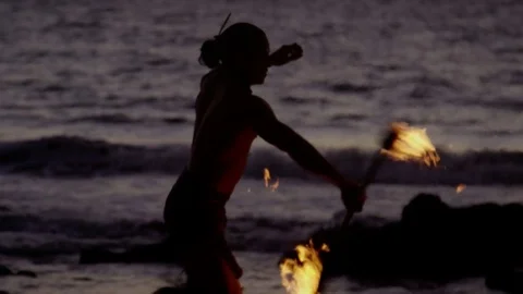 A fire dancer on the beach of Hawaii Stock Footage 76202670