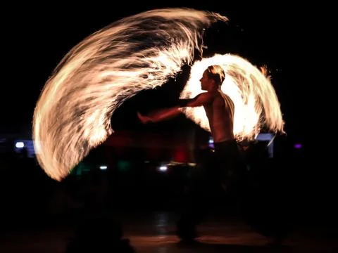 Fire dancer performing at Fire Show Dubai Desert Safari Tourist Attraction, UAE. Stock Photos