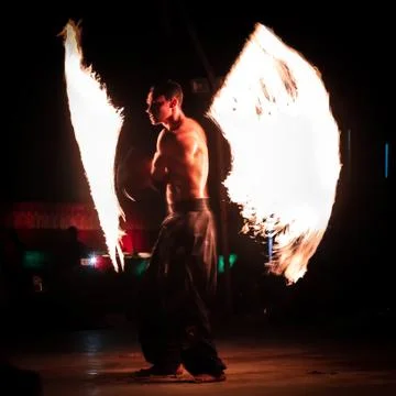 Fire dancer performing at Fire Show Dubai Desert Safari Tourist Attraction, UAE. Stock Photos