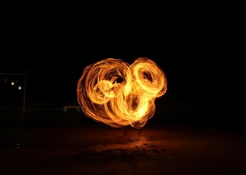 Fire dancer swing fire dancing show  Stock Photos