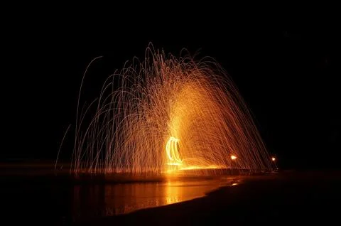 Fire dancer swing fire dancing show  Stock Photos