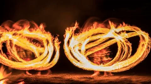 Fire Dancers on the Beach Stock Photos