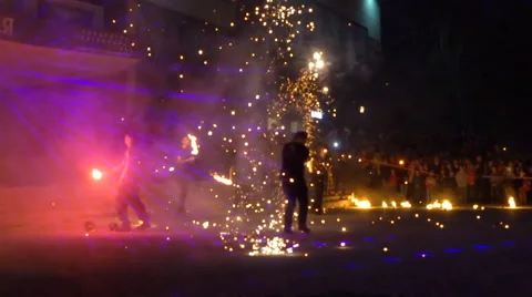 Fire dancers make fire show performance in slow motion Stock Footage 62879759
