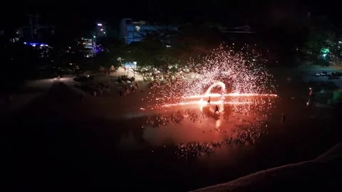 Fire dancers performing at night on the beach Stock-Footage 311693270