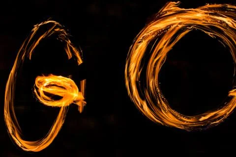 Fire dancers Swing fire dancing show fire show dance man juggling with fire Stock Photos