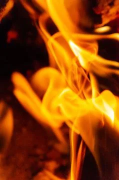 Fire like dancing and burning some woodsticks Stock Photos