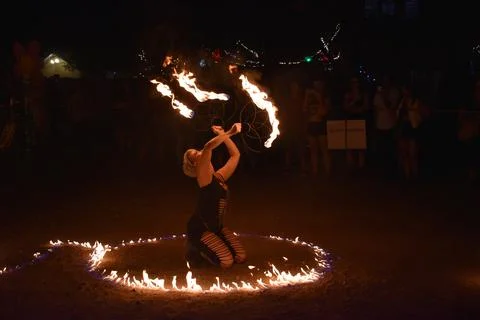 Fire Dancing Performer at night Stock Photos