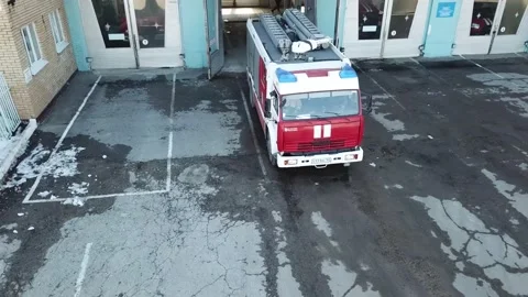 Fire department goes on a call. fire truck leaves the depot Stock-Footage 131016570