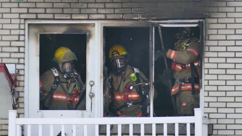 Fire department inside burned out apartment Stock Footage 139664036
