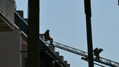 Fire descending ladder at daylight Stock Footage 116080727