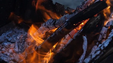The fire devours logs in the fire Stock Footage 84555561