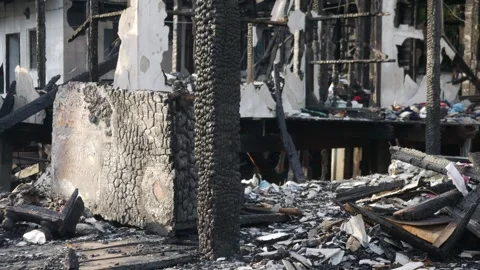 Fire disaster aftermath exterior view of destroyed house 스톡 동영상 337042327