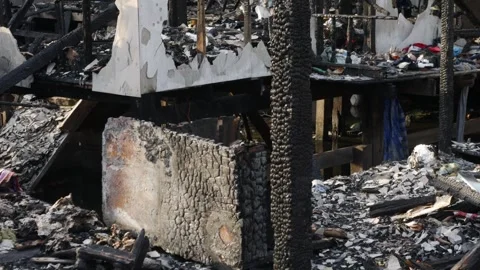 Fire disaster aftermath exterior view of destroyed house Vidéo 337291443