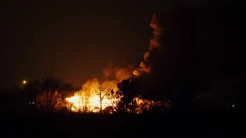 Fire disaster. night view, building on fire with horrible orange flames and Stock-Footage 146209502