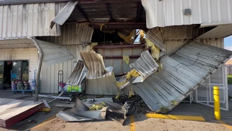 Fire at a Dollar General Store front area collapse Stock Footage 333780810