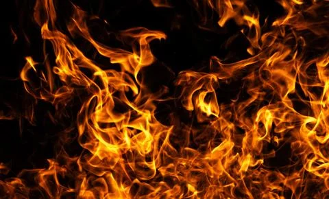 Fire dramatic flame texture. Fire hot blaze motion. Fire burning energy flo.. Stock Photos