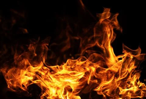 Fire dramatic flame texture. Fire hot blaze motion. Fire burning energy flo.. Stock Photos