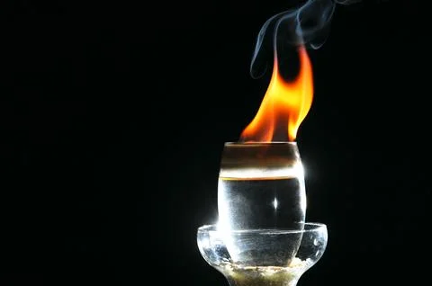 Fire in a Drink Glass Stock Photos