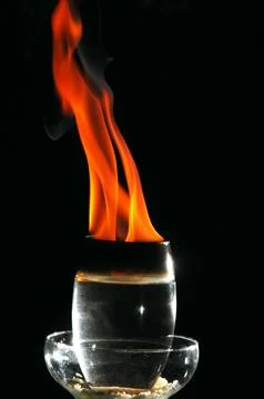 Fire in a Drink Glass Stock Photos
