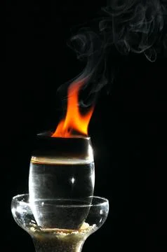 Fire in a Drink Glass Stock Photos