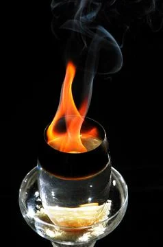 Fire in a Drink Glass Stock Photos