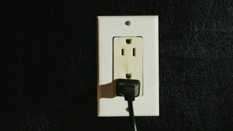 Fire in a dual-socket US type. Streams of black smoke come from the outlet Stock Footage 74592047