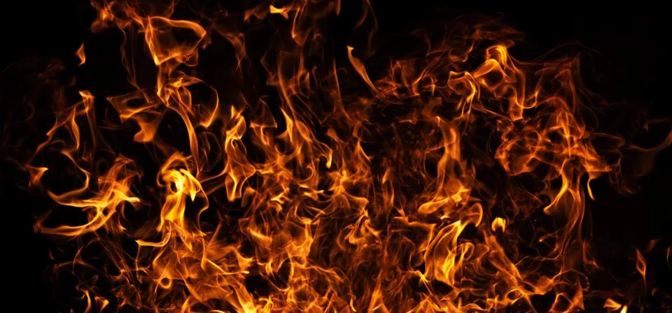 Fire dynamic flame swirl. Fire burning heat background. Fire intense energy g Stock Photos